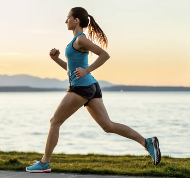 Lady running by water alt text - editzzz