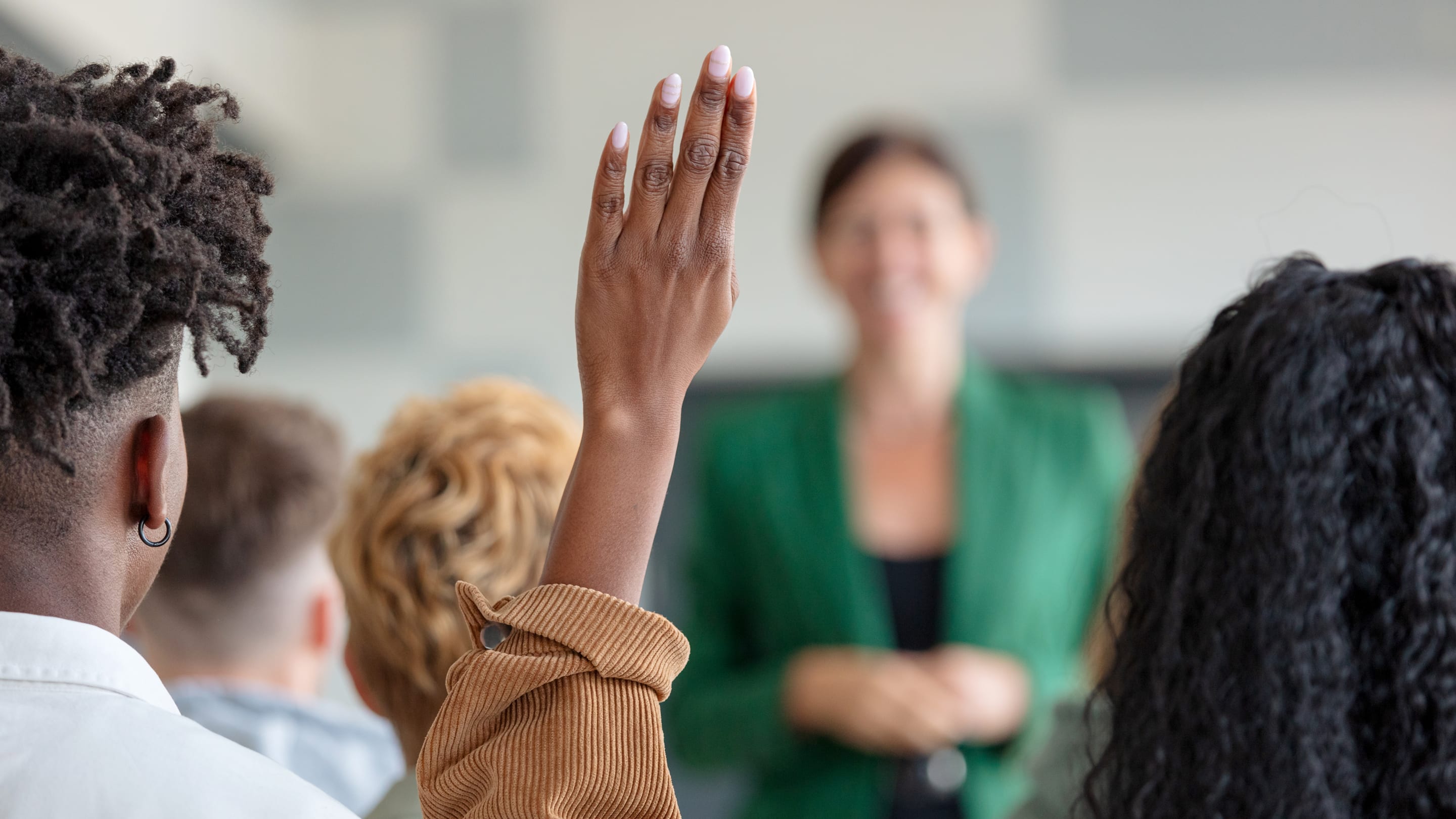 Image of A student interacting with a faculty physician or preceptor in an academic setting.