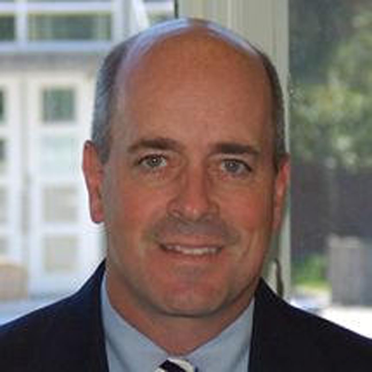 Headshot of John Gimpel, DO, MEd