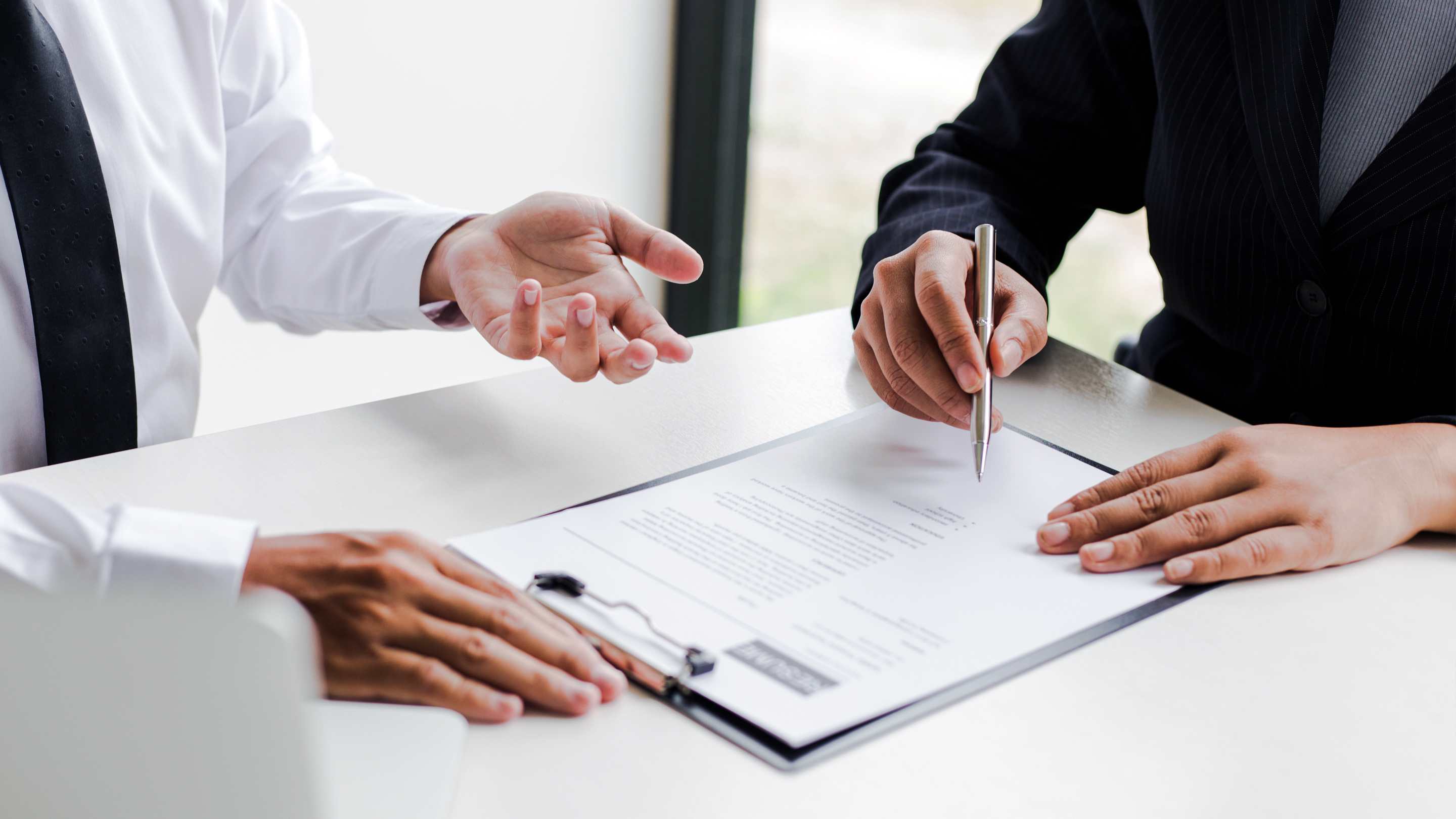 Signing a contract after reviewing it
