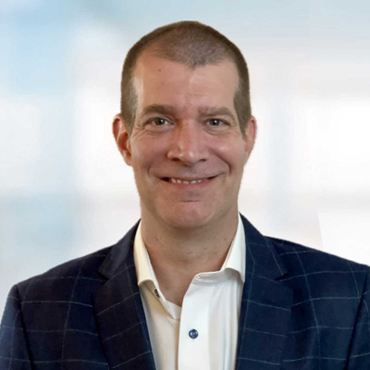 Headshot of Ryan Mullins, MD.