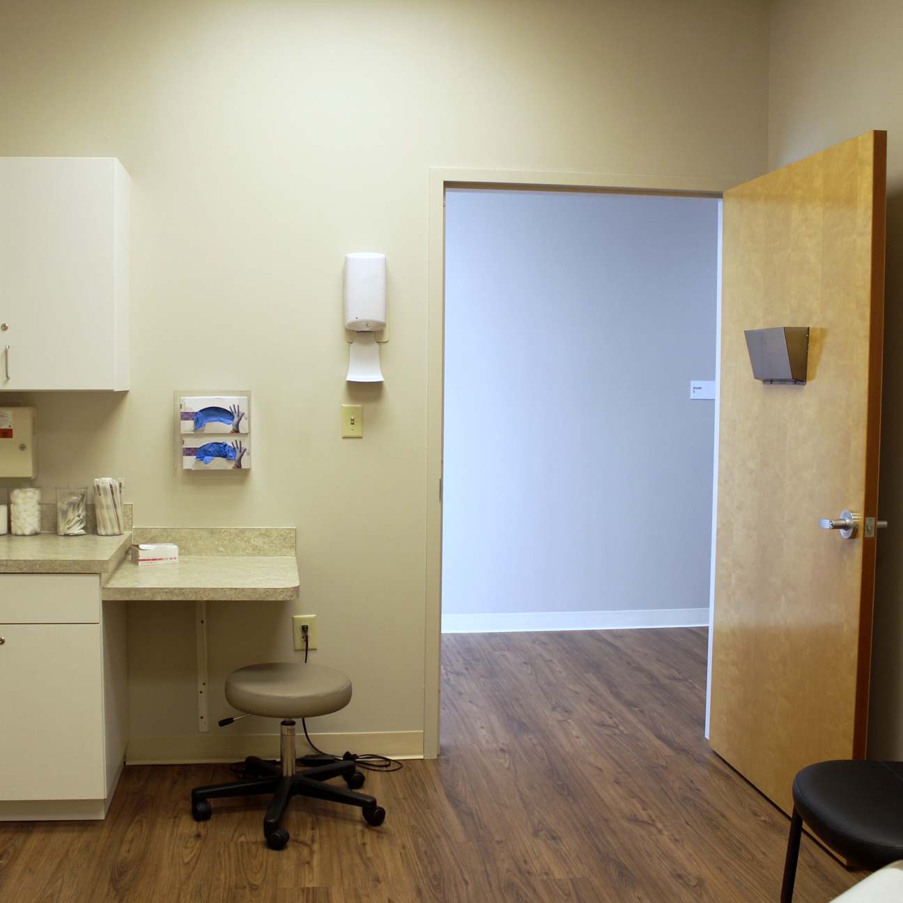 photo from inside a doctors office looking out to the hallway