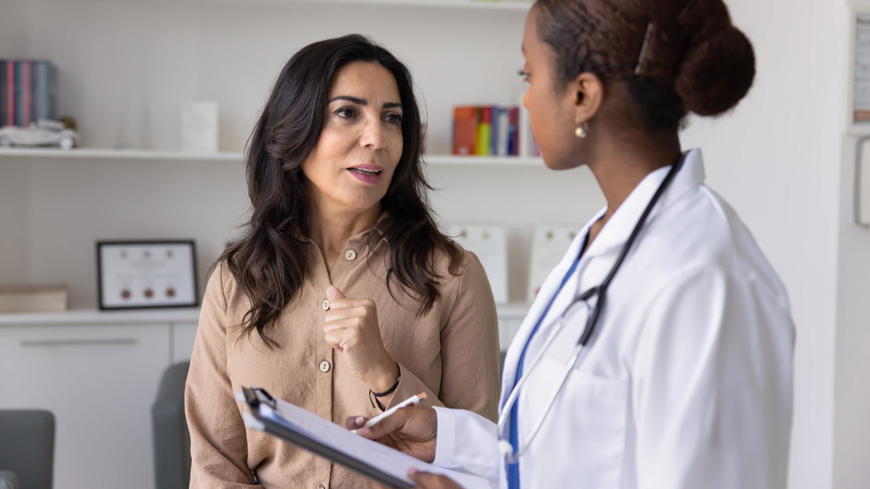 Older ADHD patient in conversation with a physician.