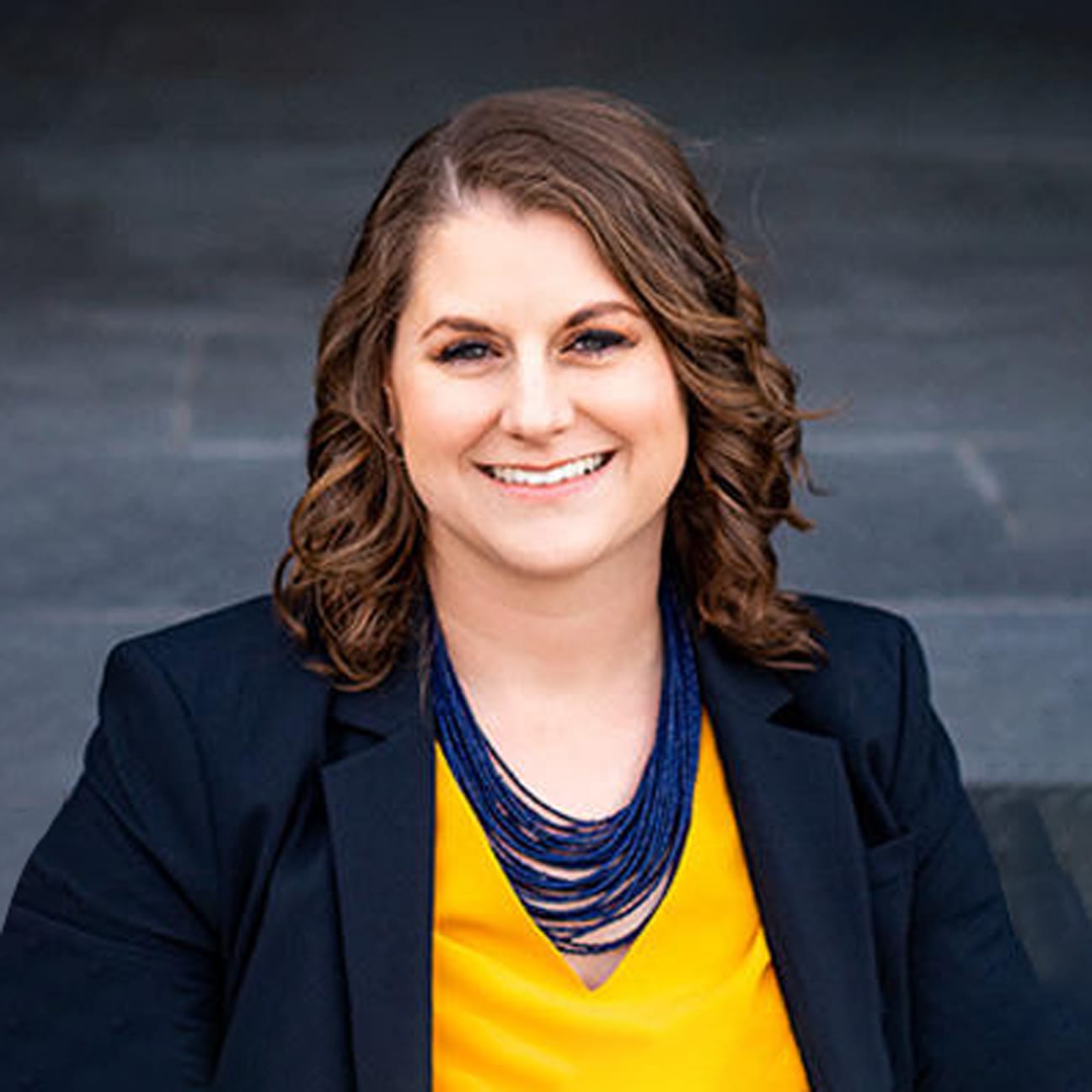 Headshot image of physician Courtney Huhn, MD, CMD.
