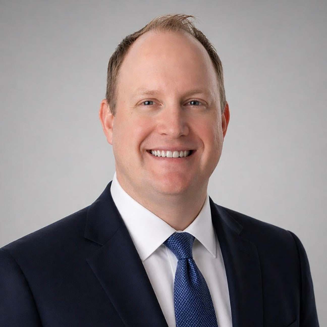 A formal headshot of Jeremy Johnson MD